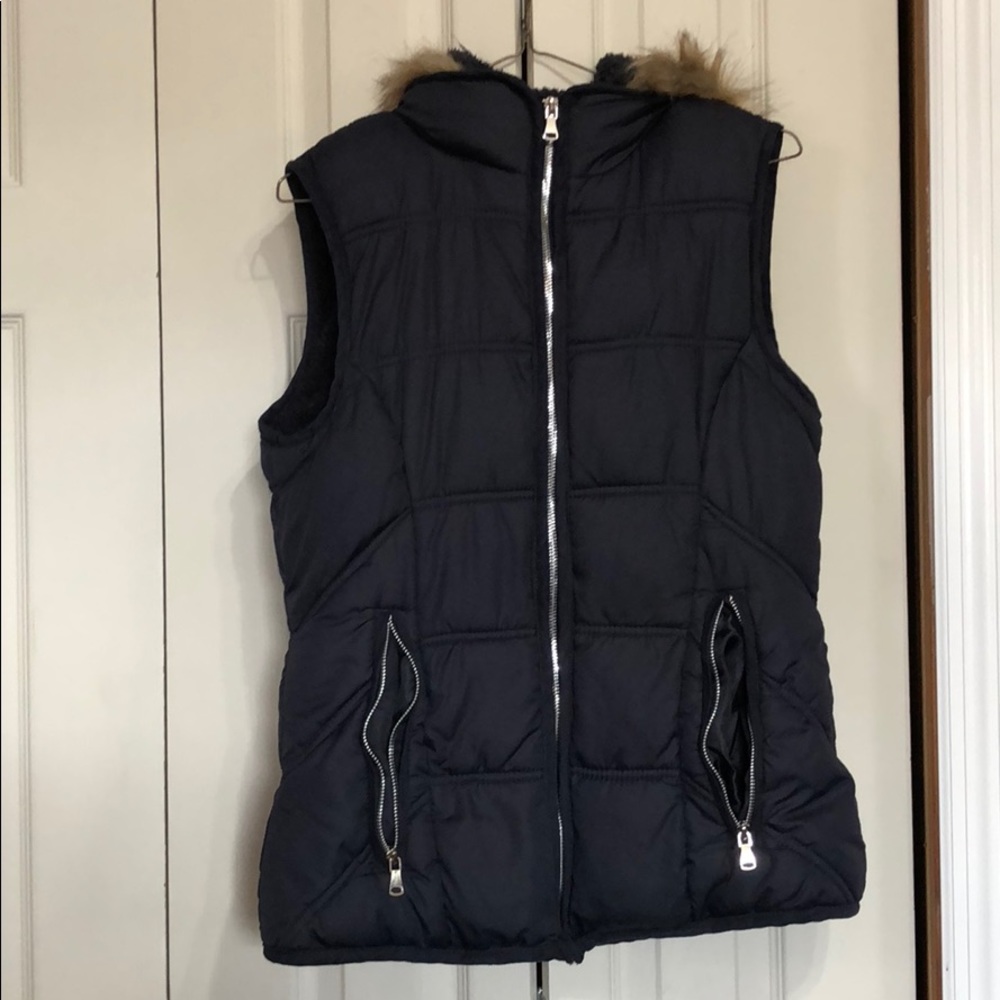 Vest with fur hood